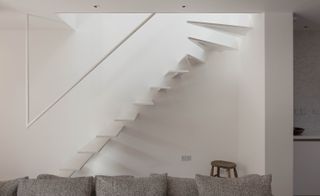 The house’s staircase is formed from steel