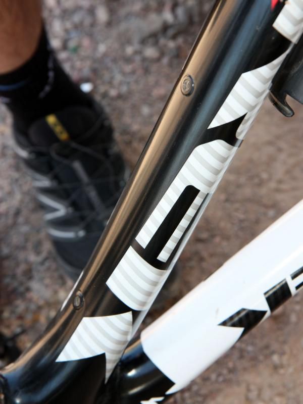 We weren't able to get a definitive answer on what these mounting holes were for on the underside of the down tube but a bolt-on fender seems likely for muddy races.