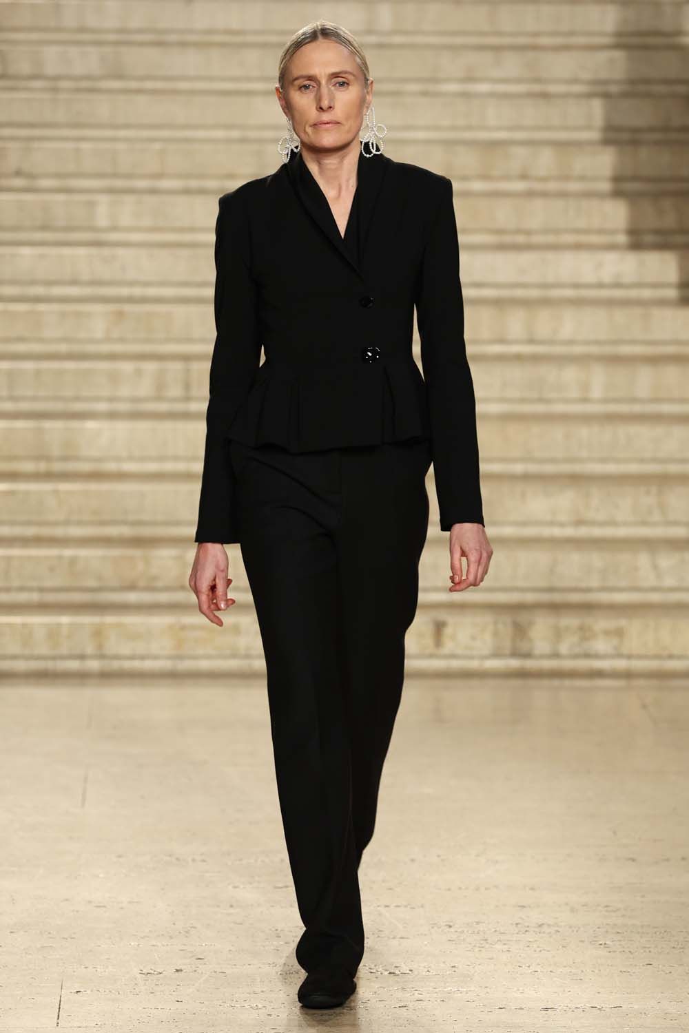 on the runway at London Fashion Week AW23