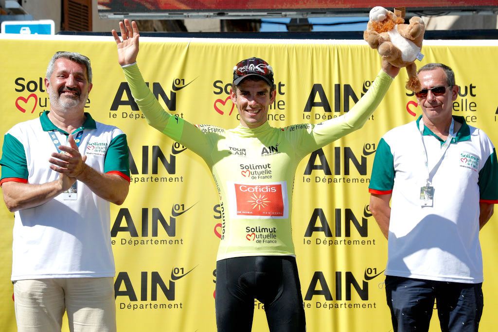 LAGNIEU, FRANCE - AUGUST 10: Guillaume Martin of France and Team Cofidis celebrates at podium as Yellow Leader Jersey winner during the 34th Tour de l'Ain 2022 - Stage 2 a 144km stage from Saint-Vulbas to Lagnieu / #TDA22 / on August 10, 2022 in Lagnieu, France. (Photo by Bas Czerwinski/Getty Images)