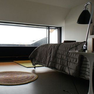 bedroom with white walls and beddings