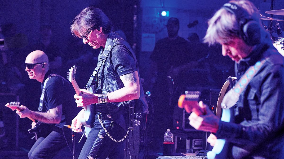 (from left) Joe Satriani, Steve Vai and Eric Johnson perform on the G3 reunion tour