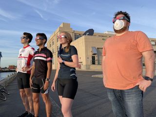 Spectators observe a partial solar eclipse from Black Falcon Cruise Ship Terminal in Boston, Massachusetts on June 10, 2021.