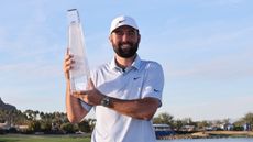 Scottie Scheffler with The American Express trophy
