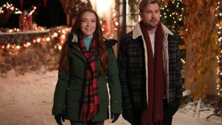 Lindsay Lohan as Sierra Belmont and Chord Overstreet as Jake Russell in the Netflix Christmas movie, Falling For Christmas.