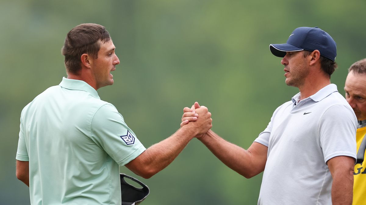 Watch The Moment Brooks Koepka Hands Bryson Dechambeau Drink Then 