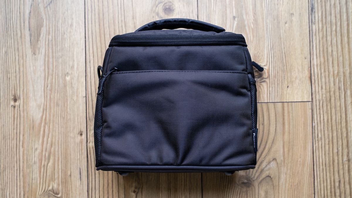 Potensic Atom SE Fly More carry bag on a wooden floor