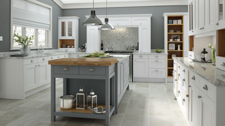A white farmhouse-style kitchen with grey kitchen island 