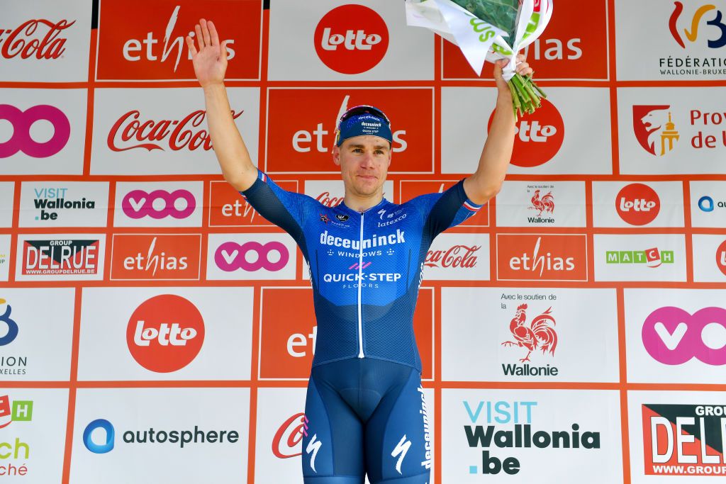HEUSDENZOLDER BELGIUM JULY 21 Fabio Jakobsen of Netherlands and Team Deceuninck QuickStep stage winner celebrates at podium during the 42nd Tour de Wallonie 2021 Stage 2 a 120km stage from Zolder Circuit to Zolder Circuit Race held at the Zolder Circuit due to flooding in the country tourdewallonie grandprixdewallonie on July 21 2021 in HeusdenZolder Belgium Photo by Luc ClaessenGetty Images