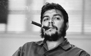 Ernesto Che Guevara smoking a cigar