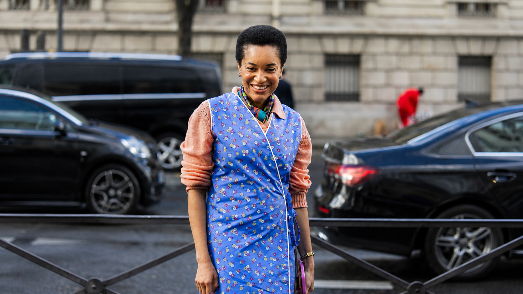 Woman in floral apron dress