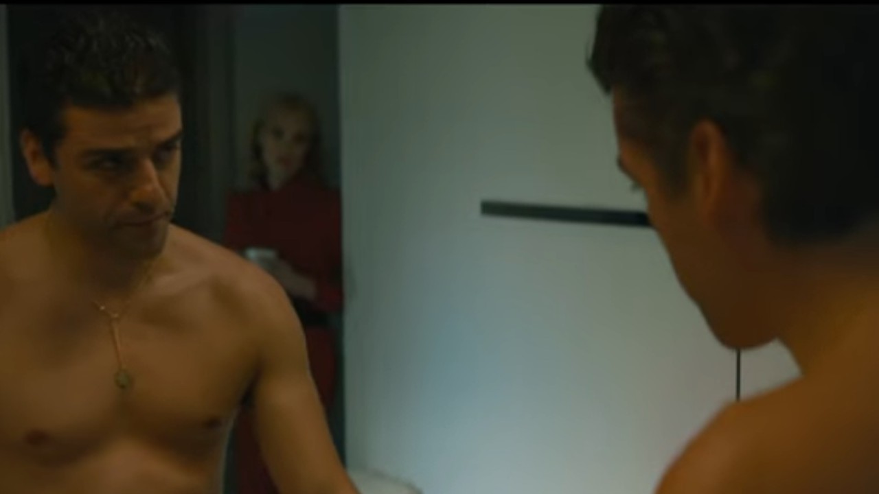 Oscar Isaac looking in the mirror in A Most Violent Year