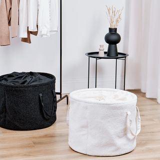 White and cream boucle storage bag in room