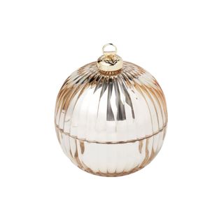 A candle shaped like a silver bulb christmas ornament