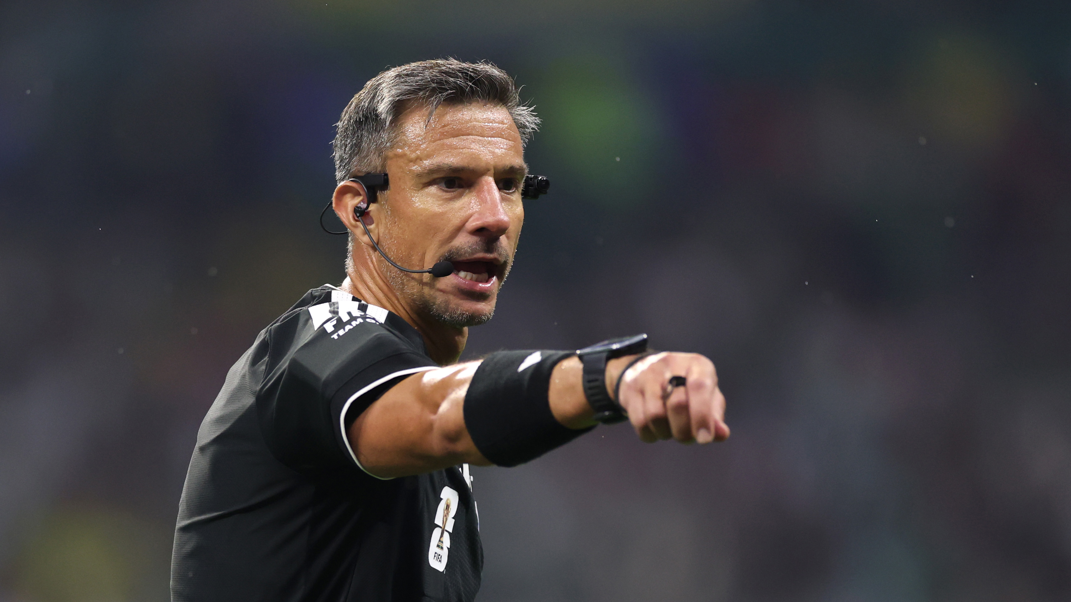 A referee wearing a headset at the FIFA World Cup 2026