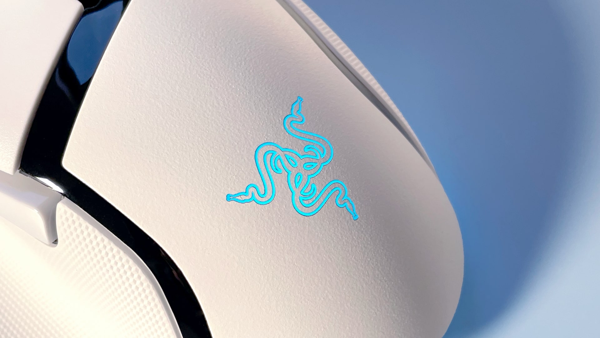 The Razer Basilisk V3 Pro 35K gaming mouse against a blue background.