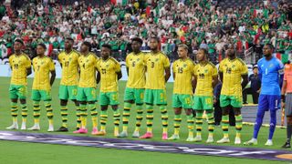 The Jamaica men's national soccer team lineup on the pitch ahead of the Jamaica vs Canada quarter-final second leg 
