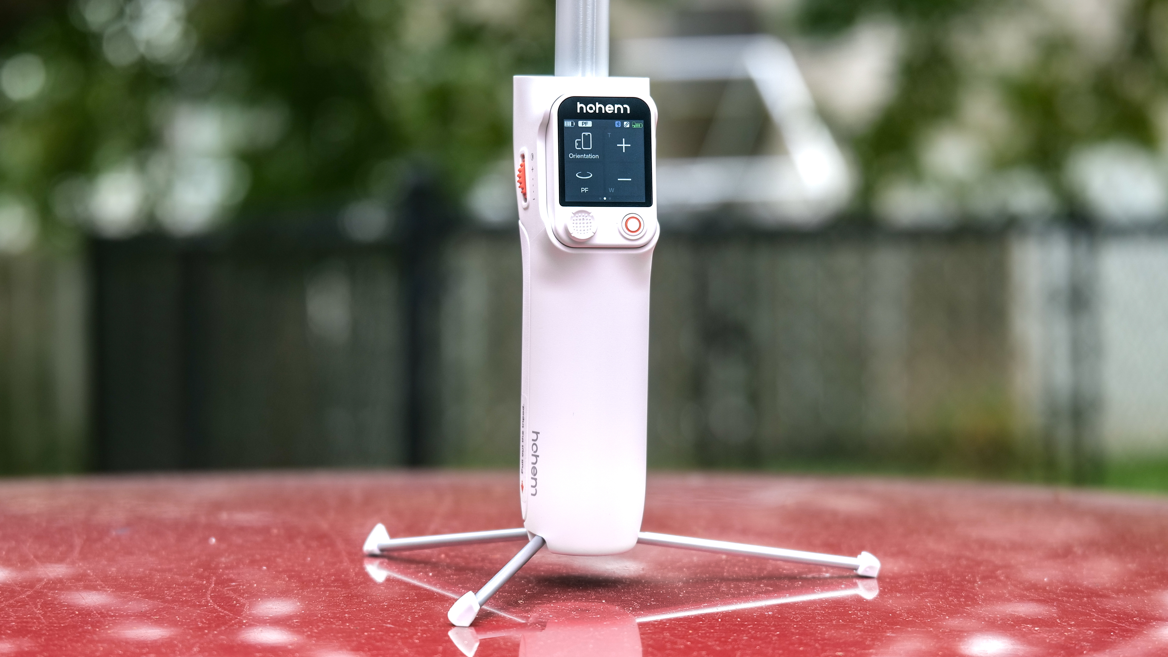 Closeup of tripod feet with Hohem iSteady V3 Ultra.