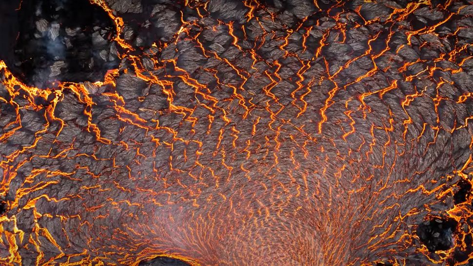 Photographer's dream comes true as he captures an active volcano in ...