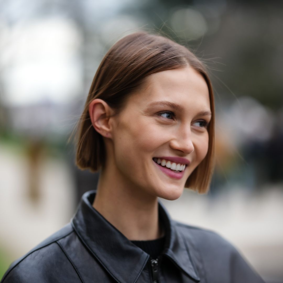 street style shot of a model with clear and glowy skin - best night cream