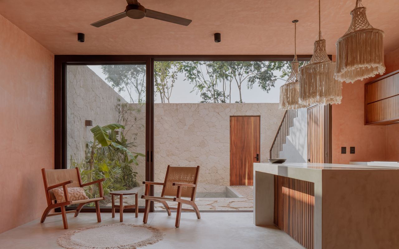 A pink limewash paint finish in the kitchen