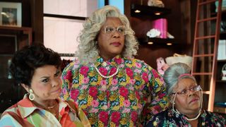 Tamela Mann as Cora, Tyler Perry as Madea and Cassi Davis as Aunt Bam standing around in Madea's Destination Wedding