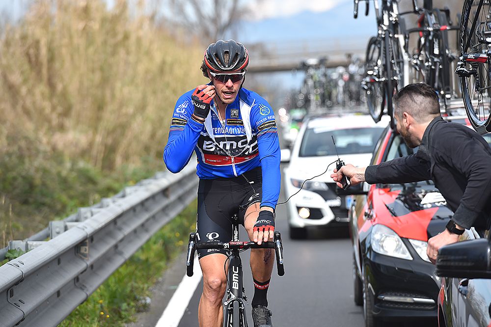 Daniel Oss (BMC) gets a radio check
