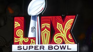 NEW ORLEANS, LOUISIANA - DECEMBER 14: The Super Bowl 59 logo on a brightly lit red and yellow sign in the French Quarter ahead of Super Bowl 2025 today