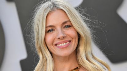 Sienna Miller is pictured with wavy hair while at the US premiere of "Horizon: An American Saga Chapter 1" at the Regency Village theatre in Westwood, California, June 24, 2024.