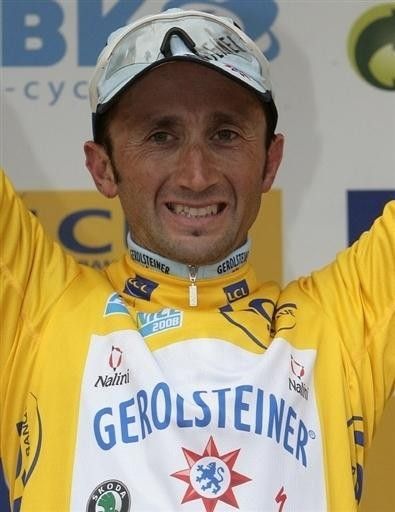 Davide Rebellin took yellow with his mad skills.