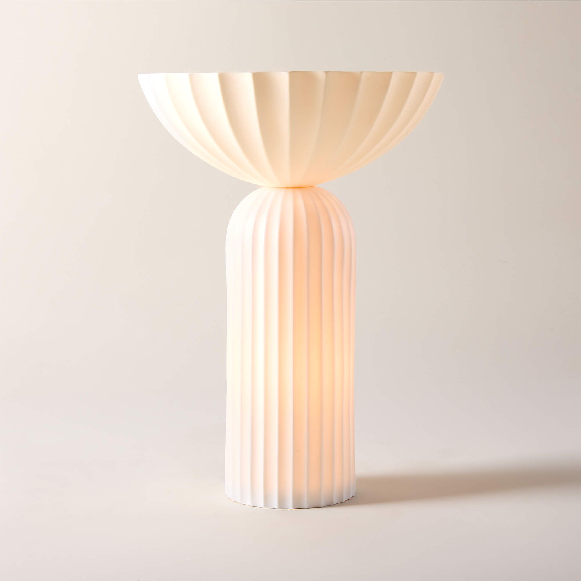 Tall ribbed porcelain lamp with dome shade