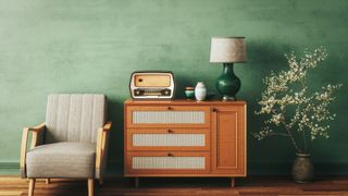 A bedroom table with vintage radio and lamp