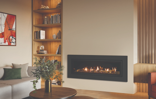 Living room alcove with lit up shelves