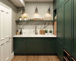 A green utility room with a marble backsplash.
