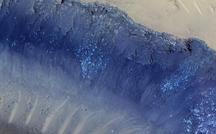 Cerberus Fossae, with steep slopes having active landslides.