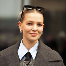 street style shot of blonde woman with glowy skin