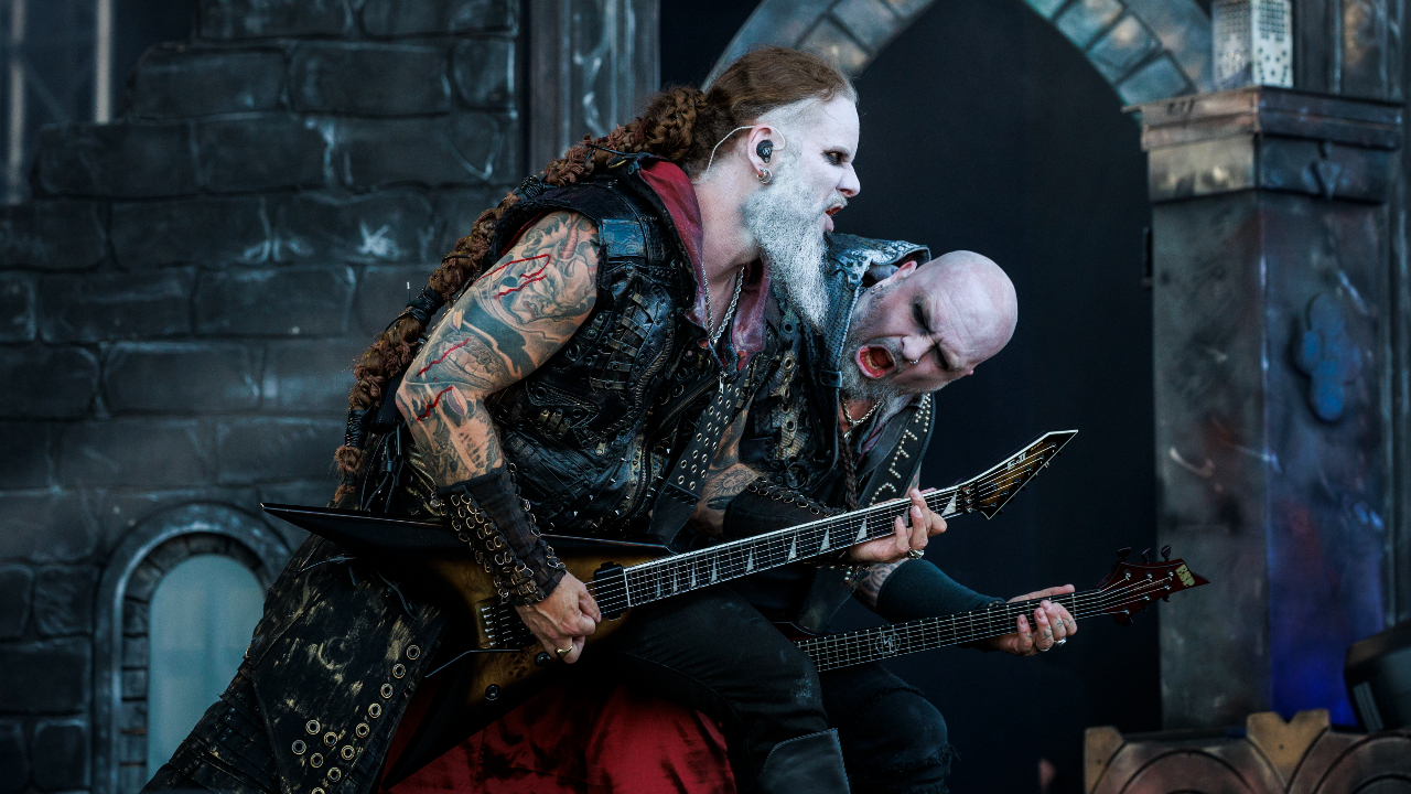 Dimmu Borgir's guitarists shredding on stage