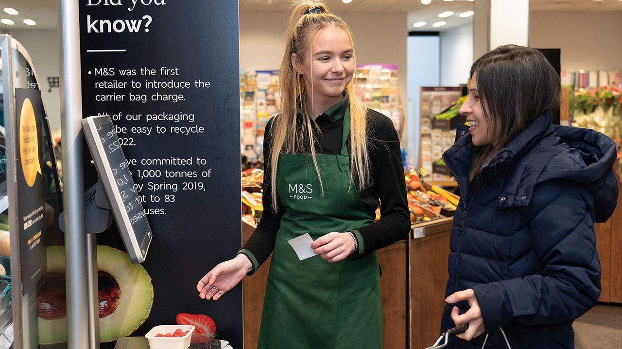 Marks &amp;amp; Spencer staff and customer © Marks &amp;amp; Spencer