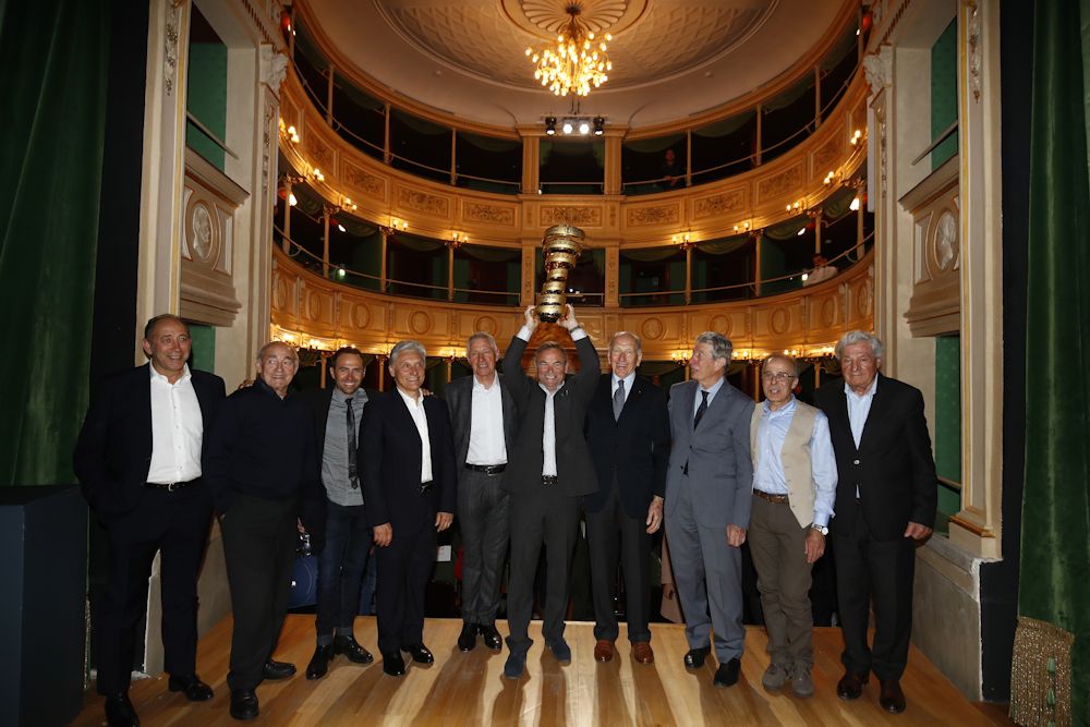 Bernard Hinault on stage with Gianni Motta, Gilberto Simoni, Giuseppe Saronni, Mauro Vegni, Francesco Moser, Felice Gimondi