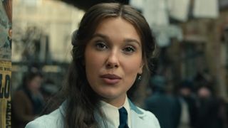 Enola talking to the camera in Enola Holmes 3.