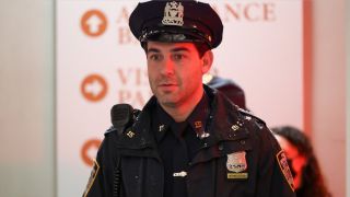 Joe in cop uniform on Ordinary Joe