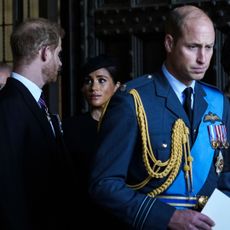 Prince William, Prince of Wales with Catherine, Princess of Wales and Prince Harry with Meghan, Duchess of Sussex leave after escorting the coffin of Queen Elizabeth II to Westminster Hall from Buckingham Palace for her lying in state, on September 14, 2022 in London, United Kingdom.