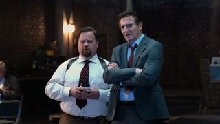 Paul Walter Hauser and Liam Neeson in The Naked Gun