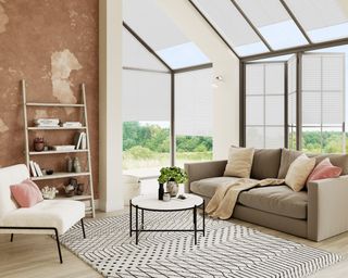 Neutrally decorated conservatory with pleated blinds in linen white by Apollo Blinds