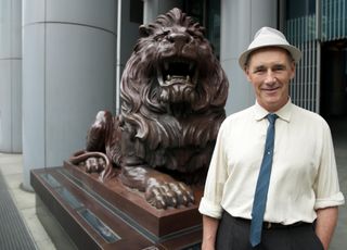 Actor Mark Rylance outside HSBC Offices in Hong Kong where his grandfather was an employee when World War Two broke out