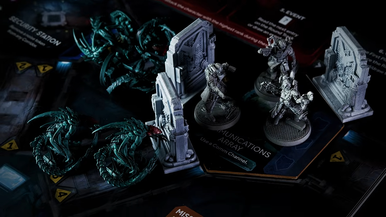 A trio of player characters stand behind closed doors, which are surrounded by aliens