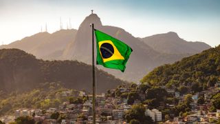 Brazilian flag and Corcovado.
