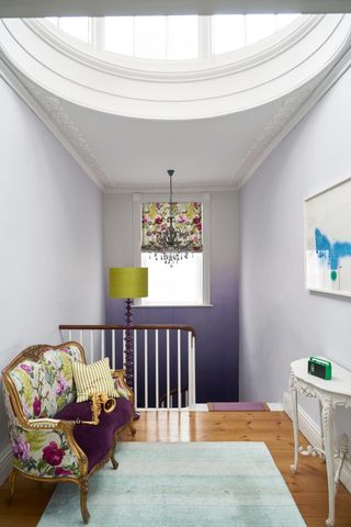 curved staircase design with ombre painted walls