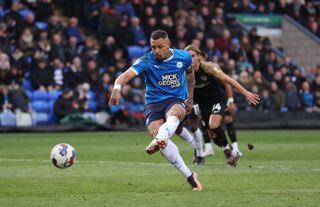 Jonson Clarke-Harris of Peterborough United scores the second goal from the penalty spot during the Sky Bet League One between Peterborough United and Portsmouth at London Road Stadium on January 28, 2023 in Peterborough, England.