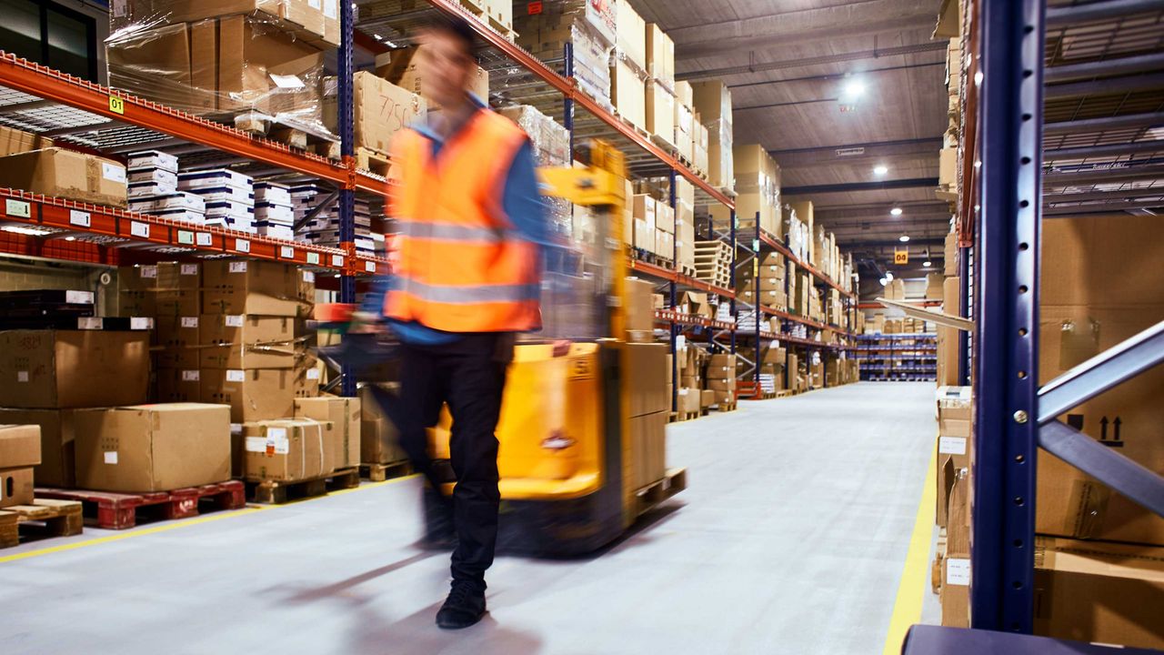 A worker in a warehouse